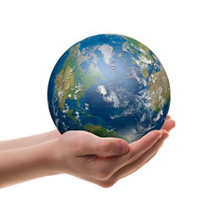 Earth in childs hands