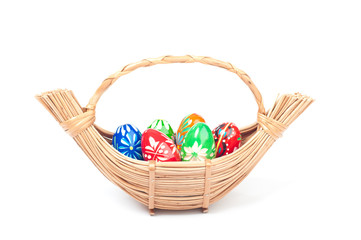 Fototapeta na wymiar Six colored eggs in basket
