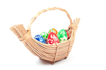 Fototapeta na wymiar Six colored eggs in basket
