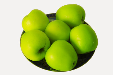 Яблоки на тарелке