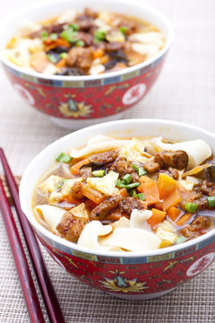 Asian wheat noodle with chopsticks