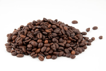 Coffee. Hill coffee beans on a white background.