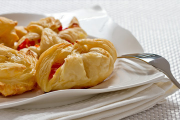 Puff pastry with  tomatoes origan and feta cheeses.
