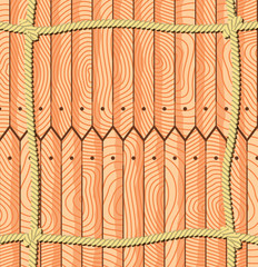 Fototapeta premium Ropes over the fence planks