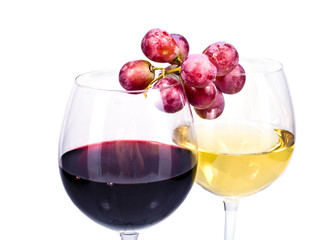 pair of wine glasses with red and white wine and grapes