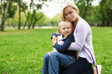 Mother and daughter in park