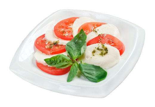 Arrangement of mozzarella and tomatoes
