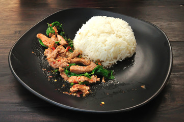 Rice with stir fried hot and spicy pork with basil