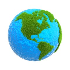 the globe with the continents of the green grass