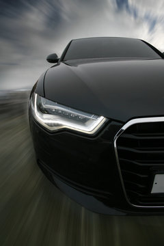 Fototapeta sports car goes on road