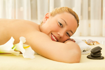 Obraz na płótnie Canvas young smiling women at spa salon relaxing