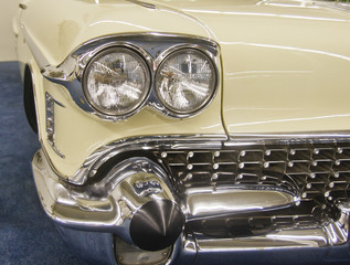 Fototapeta premium Twin Headlights on Old Yellow Classic