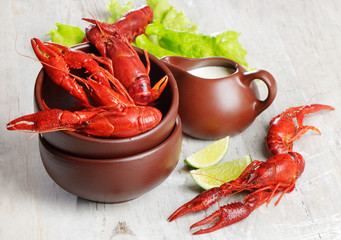 boiled crawfish with lime and fresh salad