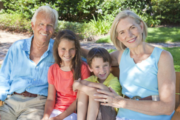 Happy Grandparents and Children Family Outside