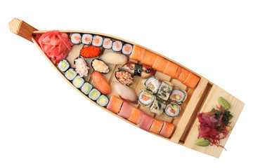 wooden ship with rolls and sushi © Alexey Astakhov