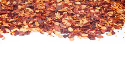Crushed Chillies on white background