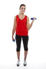 Young fit woman exercising with weights
