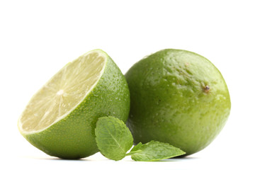 Fresh lime with mint isolated on white