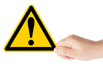 Danger And Hazard Sign in hand