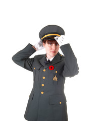 Fototapeta premium Officer putting cap on.