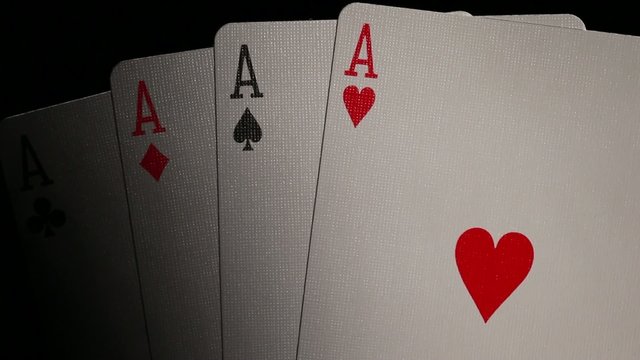 four aces cards high contrast on black