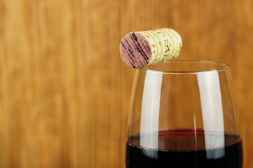Glass and cork of fine Italian red wine, closeup