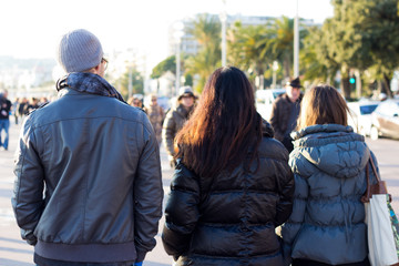 Fototapeta premium Mother Walking Along Promenade With Daughter And Son