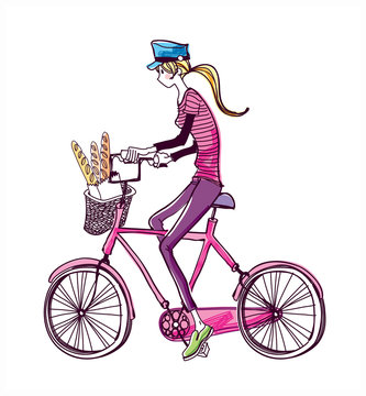 side view of woman riding bicycle