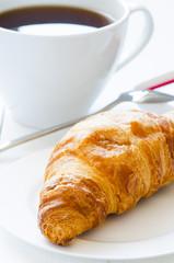 Croissant with coffee