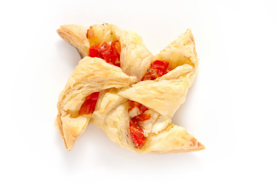 Puff pastry with  tomatoes oregano and feta cheeses.