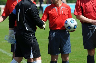 Obraz premium poignée de mains arbitres / goal