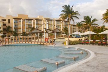 Swimming Pool with Tile Chairs in Water