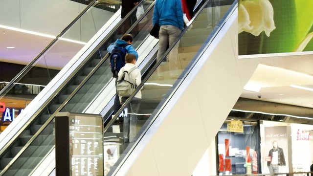 Escalators in a department Store with Peoples