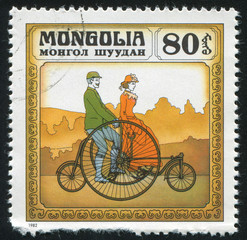 Man and Woman Riding a Bicycle