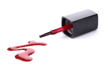 red nail polish and brush isolated on white