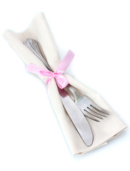 fork and knife on napkin isolated on white