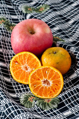 tropical fruits on nice fabric background