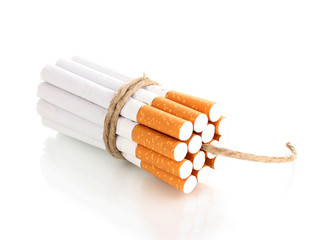 Cigarettes tied with rope and wick isolateed on white