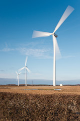 Wind turbines with motion blur vertical