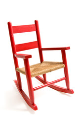 Vintage childs rocking chair isolated on white