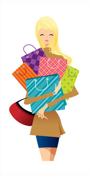 close-up of woman holding shopping bags