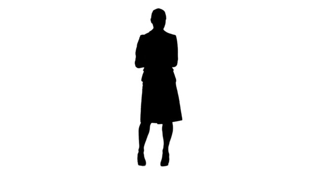 Silhouette woman holding tablet computer