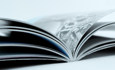 an open book lying on the table