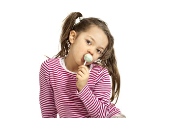 Close-up of adorable little girl with a lollipop © alexandre zveiger