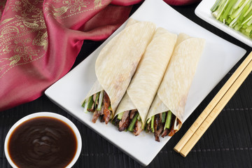 Peking Duck Wraps with spring onion, cucumber & hoisin sauce © paul_brighton