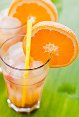 cold fresh lemonade drink with slice of orange