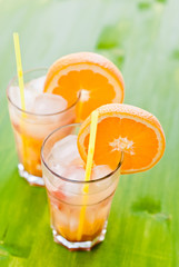 cold fresh lemonade drink with slice of orange