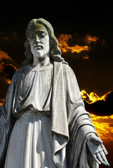 Obraz premium christ on sunset background