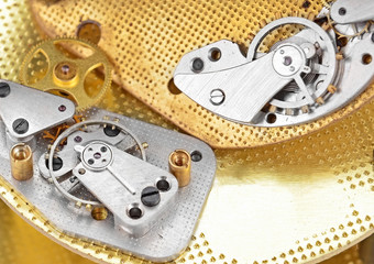 Inside the clock (clockworks), antique vintage clock mechanism