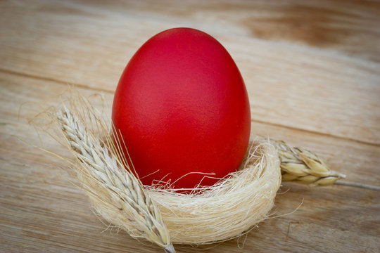Red Easter egg on the table